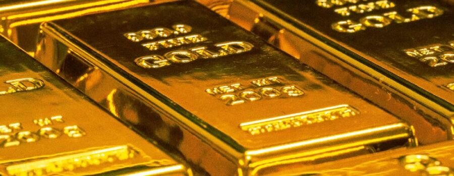 Gestapelte Goldbarren. 