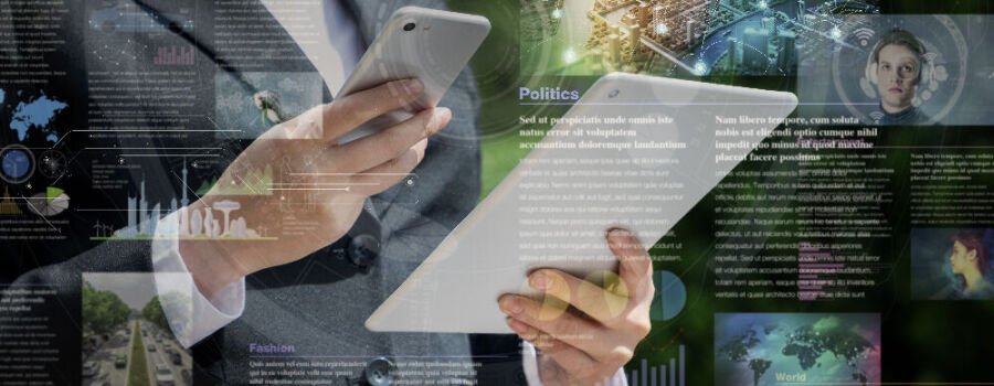 Mann mit Smartphone und Tablet (Symbolbild).